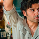A picture of Poe Dameron and his bicep. You know why it’s here.